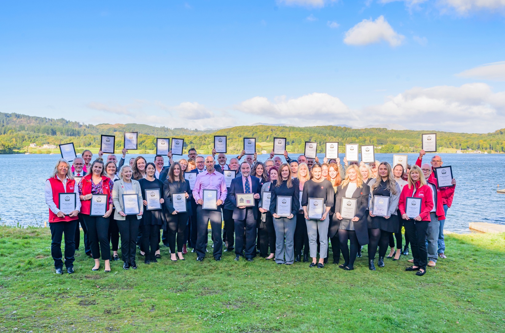 The Hackney & Leigh team celebrating their Award